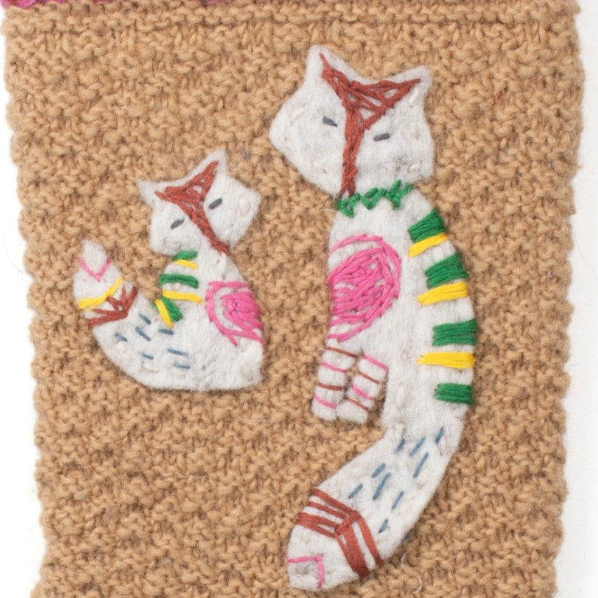 Hand-knit wool Christmas stocking with felt fox and kit motif, handmade in Nepal, Fair Trade.