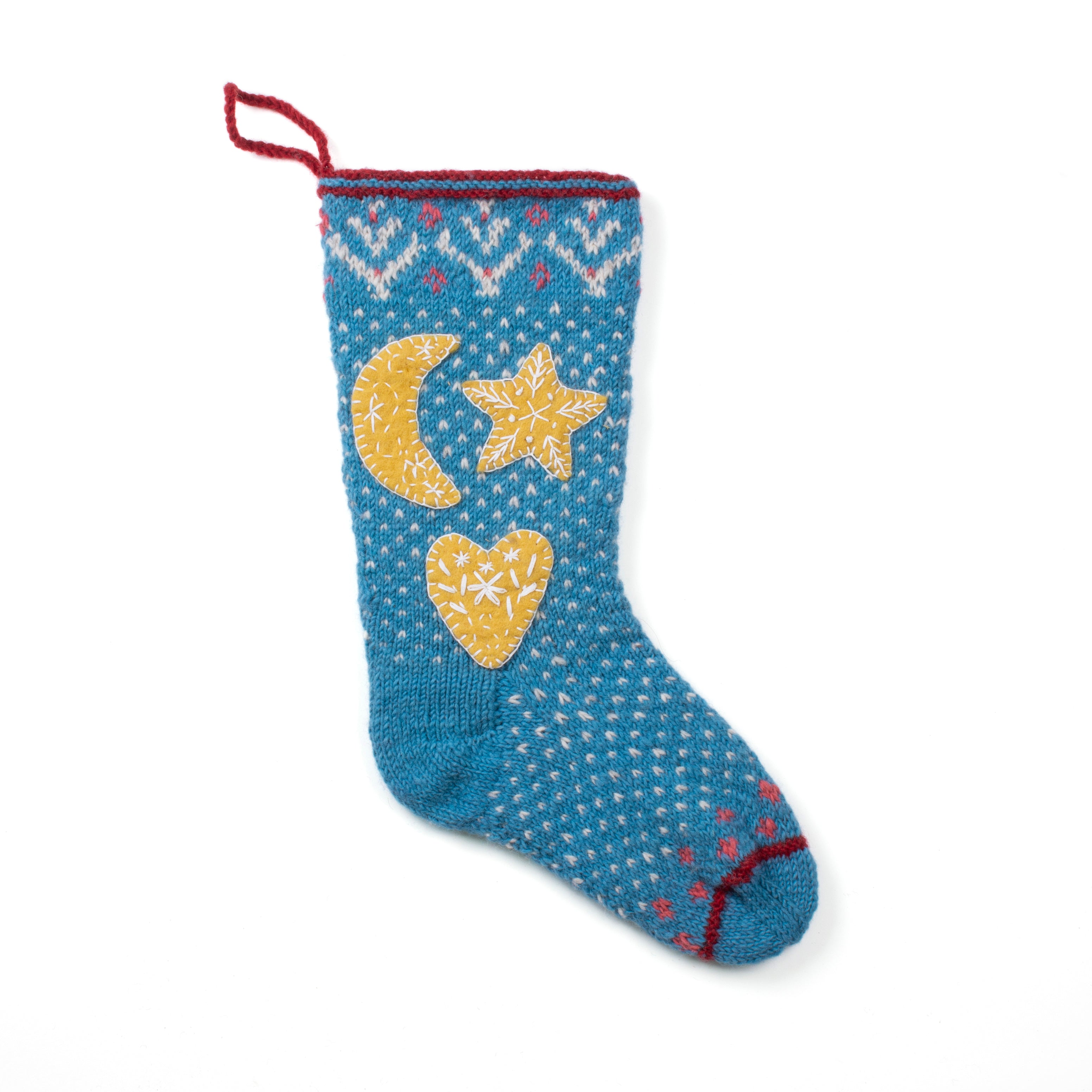 Hand-knit wool Christmas stocking with moon, star, and heart appliqué, handmade in Nepal, Fair Trade.